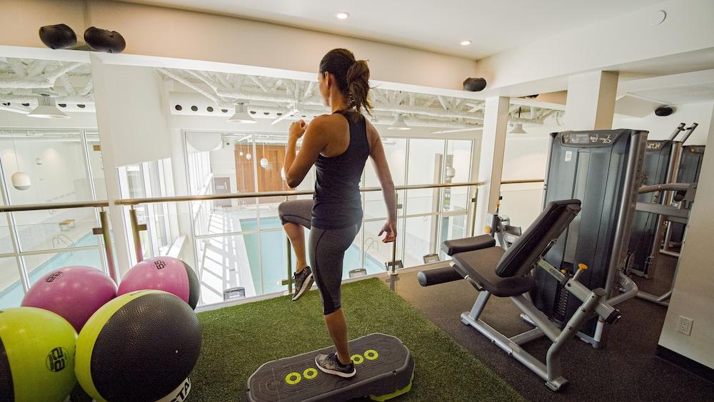 Otl Gouverneur Sherbrooke Ngoại thất bức ảnh A woman using a BOSU balance trainer